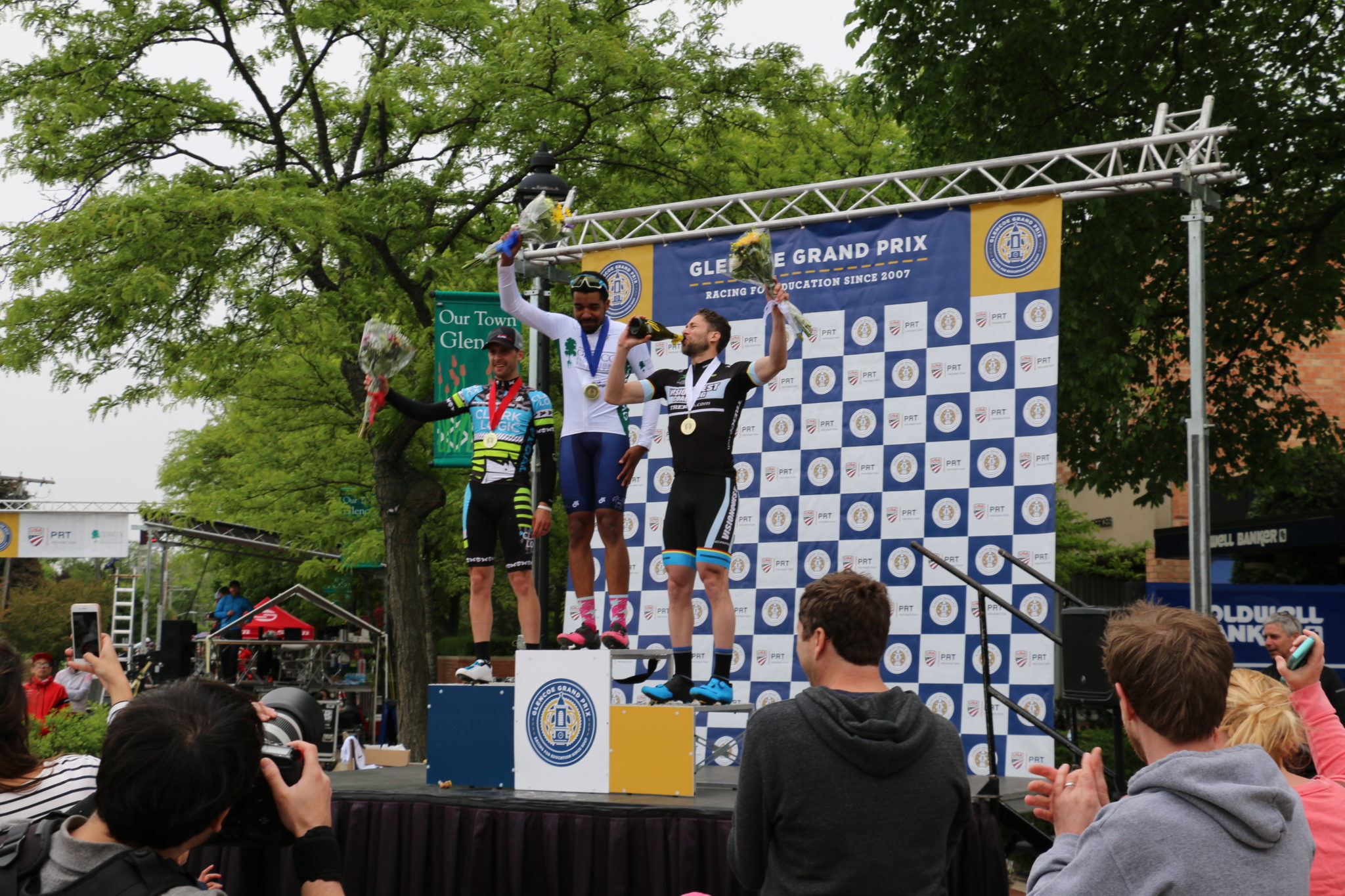 Winners receiving medals at the Glencoe Grand Prix bike race